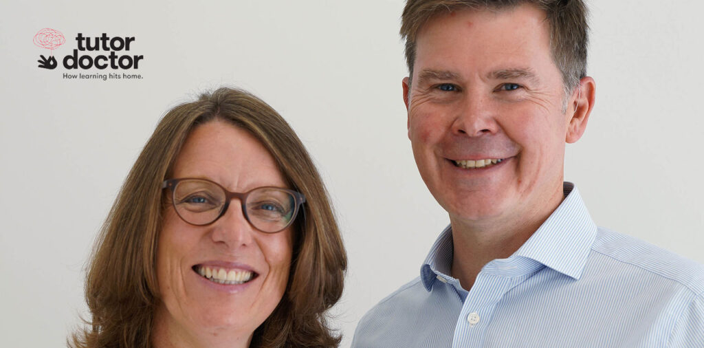 Cambridge based couple who run Tutor Doctor pose beside one another